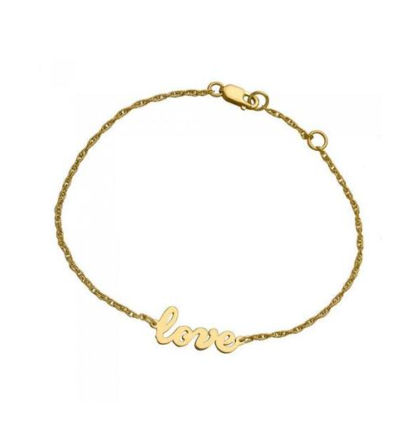 The Addison Bracelet is a timeless piece crafted by Jennifer Zeuner Designs. The symbol of love is elegantly scripted in gold plating, creating an accessory that will stand the test of time. This stunning bracelet is perfect for any occasion.
