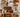 Autumn shelf styling with decorative pumpkins books and warm neutral accents