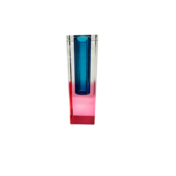 The Modern Acrylic Bud Vase is a contemporary ombre color vase perfect for adding rainbow hues to your interior. Molded out of solid color acrylic, this beautiful tabletop vase is offered in a myriad of color combinations, tempting you to do multiple vases and create pop art on your shelf or tabletop.  100% solid acrylic