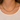 Close-up of the gold black bead fringe necklace worn with a white top on an evening stroll