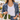 Lexi Necklace worn with a white tee and denim jacket at a farmers market