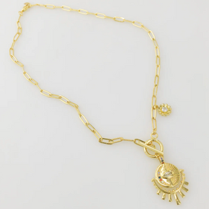 gold plated over brass. sun necklace.