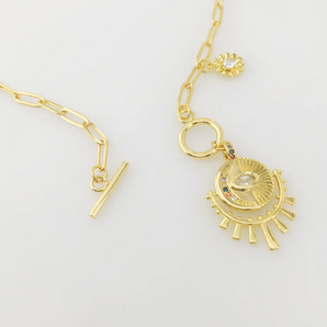 gold plated necklace. sun motif