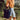 Woman carrying a navy FIELDBAR Drinks Box on a hike