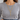 Close-up of the gold paper clip lariat necklace with crystal lock worn over a gray long-sleeve top