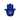 Top view of blue hamsa hand napkin weight with evil eye