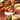 Mini cheese board accessory on a charcuterie platter, close-up
