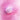 Pink Musee bath balm fizzing in bath water