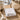 Apres ski notepad on wooden table with snowy chalet view