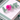 Tennis Love napkin weight on green striped napkins