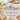 White cutlery caddy on a holiday buffet with turkey and pies