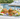 Woven print acrylic brunch tray with bagels and lox by a pool